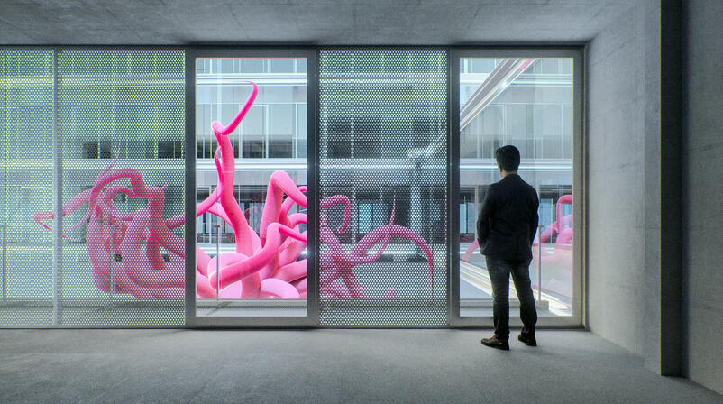 man looking at pink sculpture